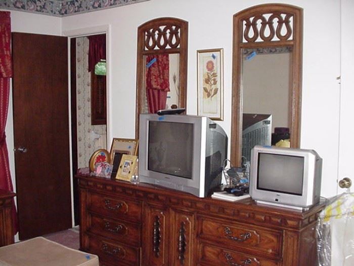Triple dresser; two mirrors; small and large televisions; frames; etc.