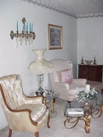 French provincial chair with cream damask upholstery and wing chair in white uypholstery
