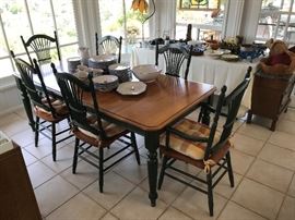 Painted wheat back breakfast chairs in table