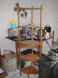 Wood shelf unit, books, cast iron stove, antique irons, shoe forms