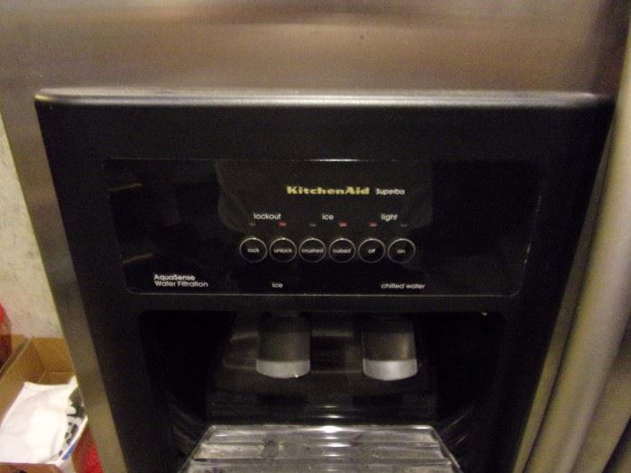 KitchenAid side by side stainless steel refrigerator with ice/water dispenser