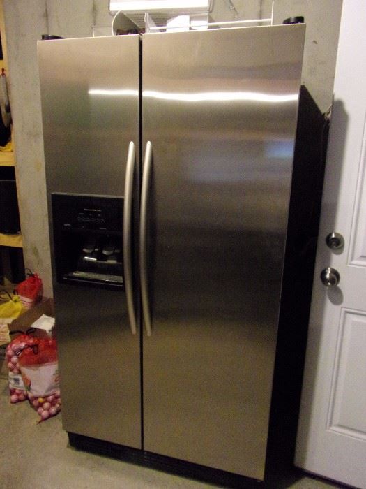 KitchenAid side by side stainless steel refrigerator with ice/water dispenser