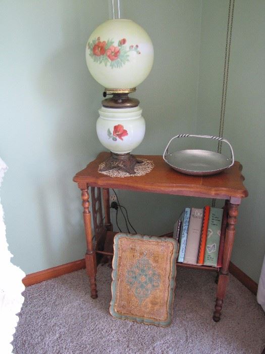 Cool antique book shelf with a Gone with the Wind lamp