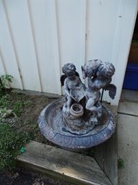 Fountain with electric pump.