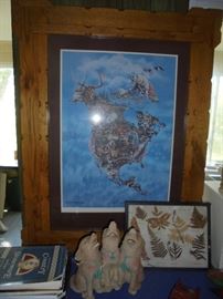 A very large wildlife themed, pine framed art piece.
