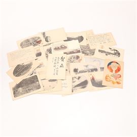 Circa 1940 Japanese Postcards: A group of Japanese postcards circa 1940. There are twenty-four in total that feature black and white landscape scenes, figural vignettes, character with Japanese characters. There is a color Santa Claus card with toy designs.