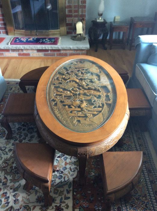 JAPANESE CARVED SAKI TABLE WITH PULL OUT STOOLS