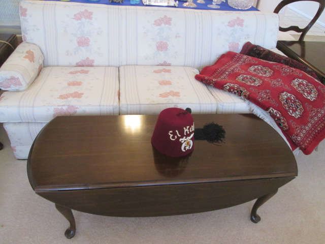 Drop-leaf Coffee Table and 2 matching End Tables, Sofa and great RED rug. Shriner's Hat, anyone?