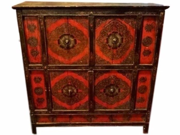 $620.00 - ANTIQUE CHINESE TIBETAN POLYCHROME CABINET, CARVED FOLIATE DESIGNS AND CALLIGRAPHY ON DOOR