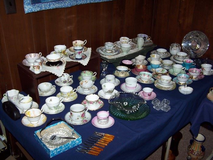 Many cups and saucers