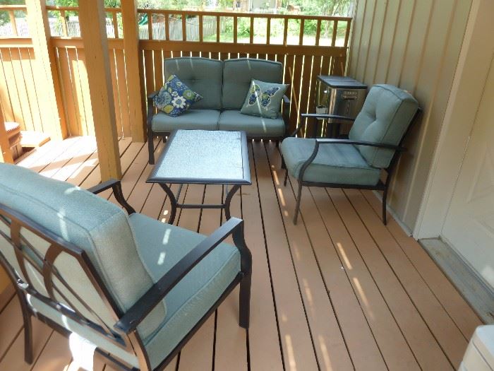 Patio set love seat, 2 chairs, coffee table and cushions