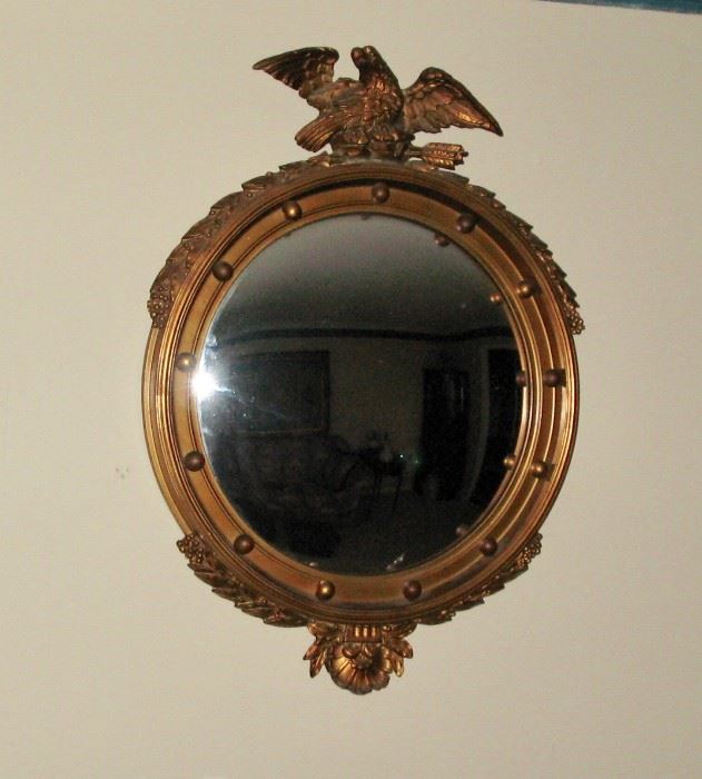 Gold gilt bull's eye mirror