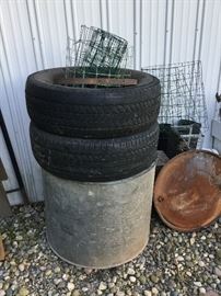 spare tires for the tractor, bins, wire fencing