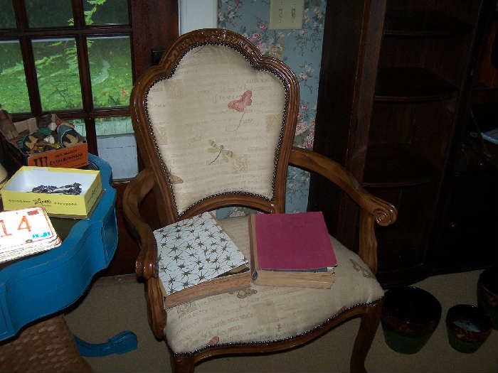 ONE OF A PAIR OF ARMCHAIRS & OLD SEARS CATALOGUES
