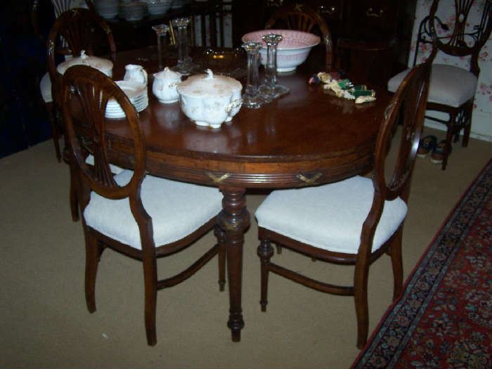 OVAL DINING TABLE & 6 CHAIRS WITH BRASS MOUNTS