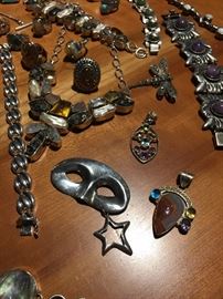 signed sterling mask & star pin top right in this pic-is vintage mexico sterling w/ stones bracelets