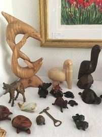 all kinds of wood animals- ironwood items also lots of turtles and large dolphin sculpture