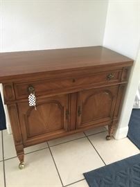 buffet on wheels top comes open for larger serving area