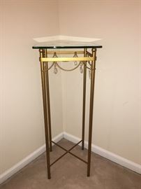 Tall gold stand with glass shelf & crystals. 