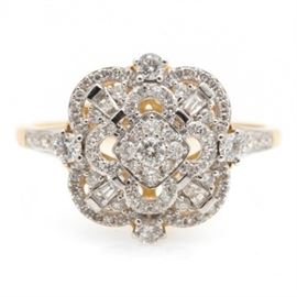 14K Yellow Gold 1.00 CTW Diamond Ring: A 14K yellow gold ring with 1.00 ctw diamonds. This ring features an open scalloped body housing ninety-one diamonds to the setting and shoulders above a scrolled gallery.