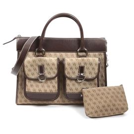 Vintage Dooney & Bourke Handbag with Matching Cosmetics Case: A vintage 1980s Dooney & Bourke handbag with matching cosmetics case. The brown and tan fabric and leather bag is marked with serial number K905393. The bag dates to the 1980s, and has a red, white and blue tag. Includes a matching cosmetics case.