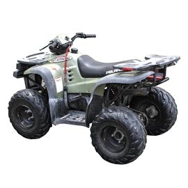 Polaris 90 Sportsman ATV: A 2001 Polaris 90 Sportsman all-terrain vehicle. The VIN is RF3FA09C62T048607. The body of the vehicle is olive green, with a black vinyl upholstered seat. It has a rack attached on the front and one on the back, which are made of high density plastic, with pierced surfaces to allow items to be lashed in place. A label on the vehicle is marked with the date “03/12/2001”, VIN, and “Made in Taiwan by Aeon Motor Company for Polaris Industries”.