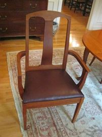 Leather upholstered seats:  2-Arm Chairs , 6- Side Chairs