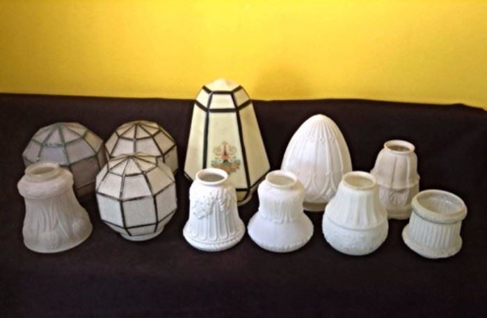 An assortment of glass shades for table lamps