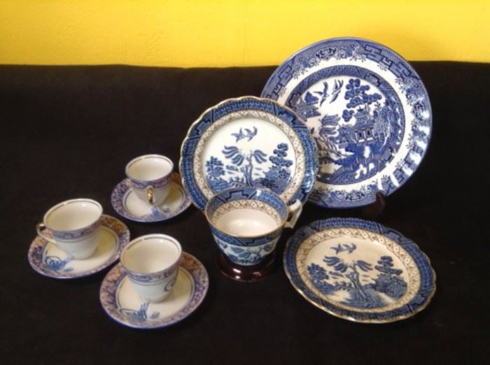 Blue on white porcelain dishes cups and saucers