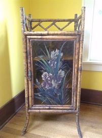 Bamboo side cabinet with floral design
