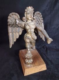Wood carved figurine or deity