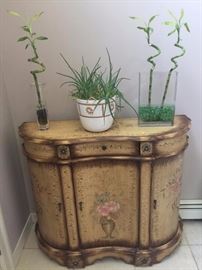 Stenciled Cabinet with Bamboo and Potted Plant