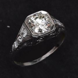 1.53 ct center diamond VVS2/L color with GIA certificate and 6 side diamonds ring size 9 1/4, bid online at www.fairfieldauction.com
