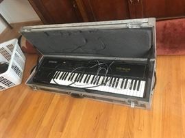 #49 Ensonic Mirage keyboard in case w/ stand $200
