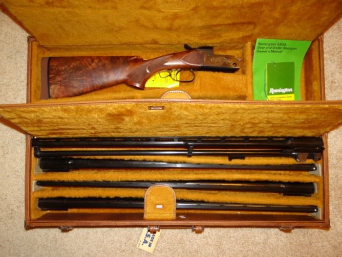 Remington 3200 Competition Skeet Over/Under Shotgun with 12ga, 20ga, 28ga & 410ga Barrels.  The Ultimate Skeet Shotgun Set. Doesn't look like it's ever been fired.
