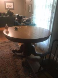 #60 Round Oak Table on Pedestal $150
