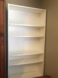 #25 White laminate Bookcase 32x11x78 $30
