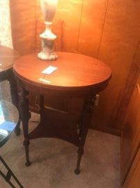 #70  Round cherry table wtih carve front  24x30   $175