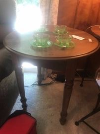 #69 Round light wood table with 4 legs 28x29 $100
