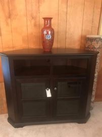 #26 Entertainment Center with glass doors 50x17x40 $120
