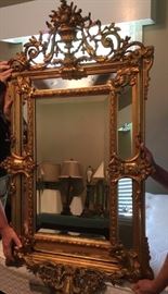 #43 Gold Bevel mirror with wood design on top and bottom 26x51 $150
