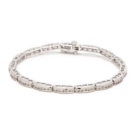 14K White Gold Channel Set 1.92 CTW Diamond Bracelet: A 14K white gold channel set diamond bracelet comprising 1.92 ctw in round brilliant cut diamonds.