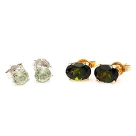 14K White and Yellow Gold Green Tourmaline and Peridot Studs: A pair of 14K yellow gold green tourmaline studs, and a pair of 14K white gold peridot studs. One pair features faceted oval green tourmalines in yellow gold and the other pair feature faceted round peridots in white gold.