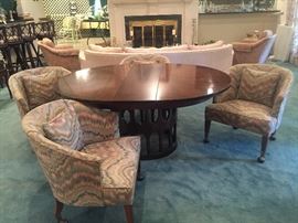 Mid-Century Modern table with one leaf - Round or oval options.  Flame stitch Mid-Century chairs on rolling brass casters