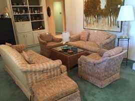 Sofa, love seat, and club chairs with ottomans