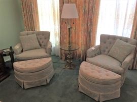 Pair of matching swivel chairs with half moon ottomans.  Stiffel Floor Lamp Attributed to Tommi Parzinger 
