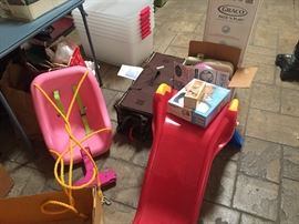 Two nearly new Graco Pack N Play, slide, swing, booster chair and other baby items
