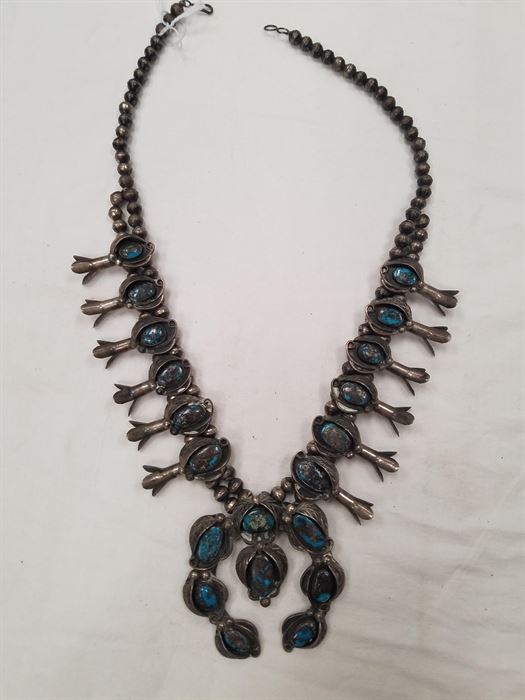 One of many squash blossom sterling and turquoise necklaces