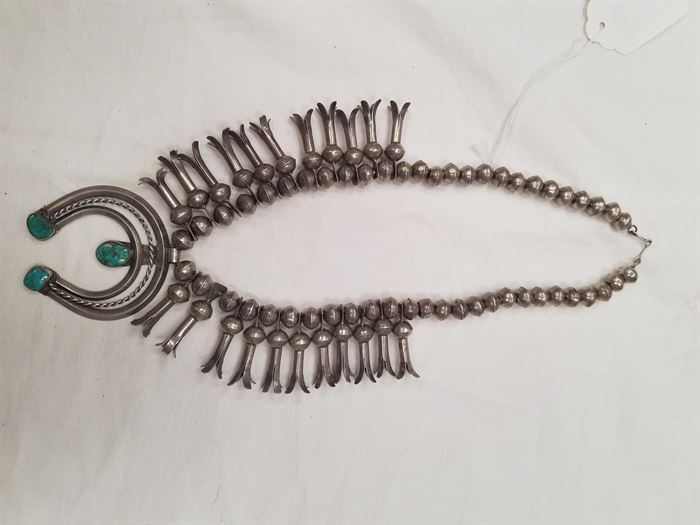 One of many sterling and turquoise squash blossom necklaces