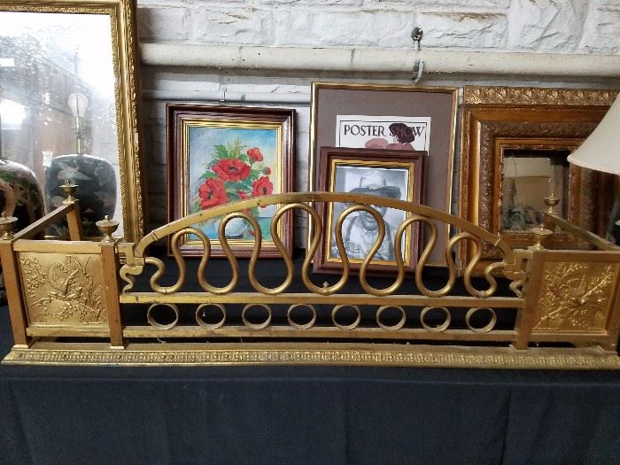 Brass fireplace fender, numerous antique frames and prints